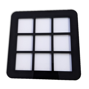Photo of a 3x3 Board with black edges and white squares