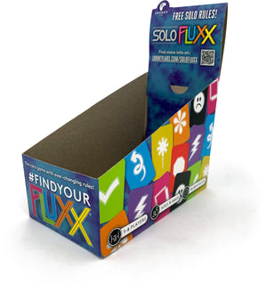 Photo of our Generic Flux Display covered in colorful icons and Fluxx logo.