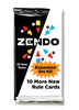 Image of the foil packaging for Zendo Rules Expansion #2 with a half black half white background and illustrations of pieces and marking stones